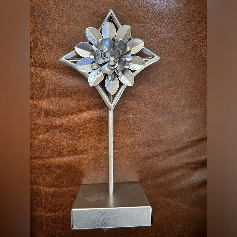 Home decor accents  two silver flowers on pedestal stand